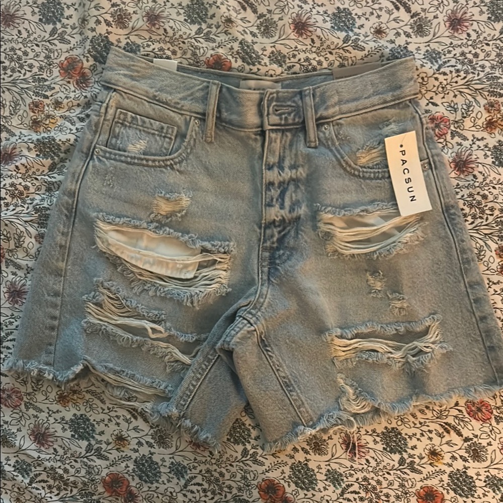 Light Blue Jean Shorts with Distressing and Mid-Thigh Length